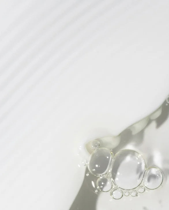 Close-up of water droplets on a white background