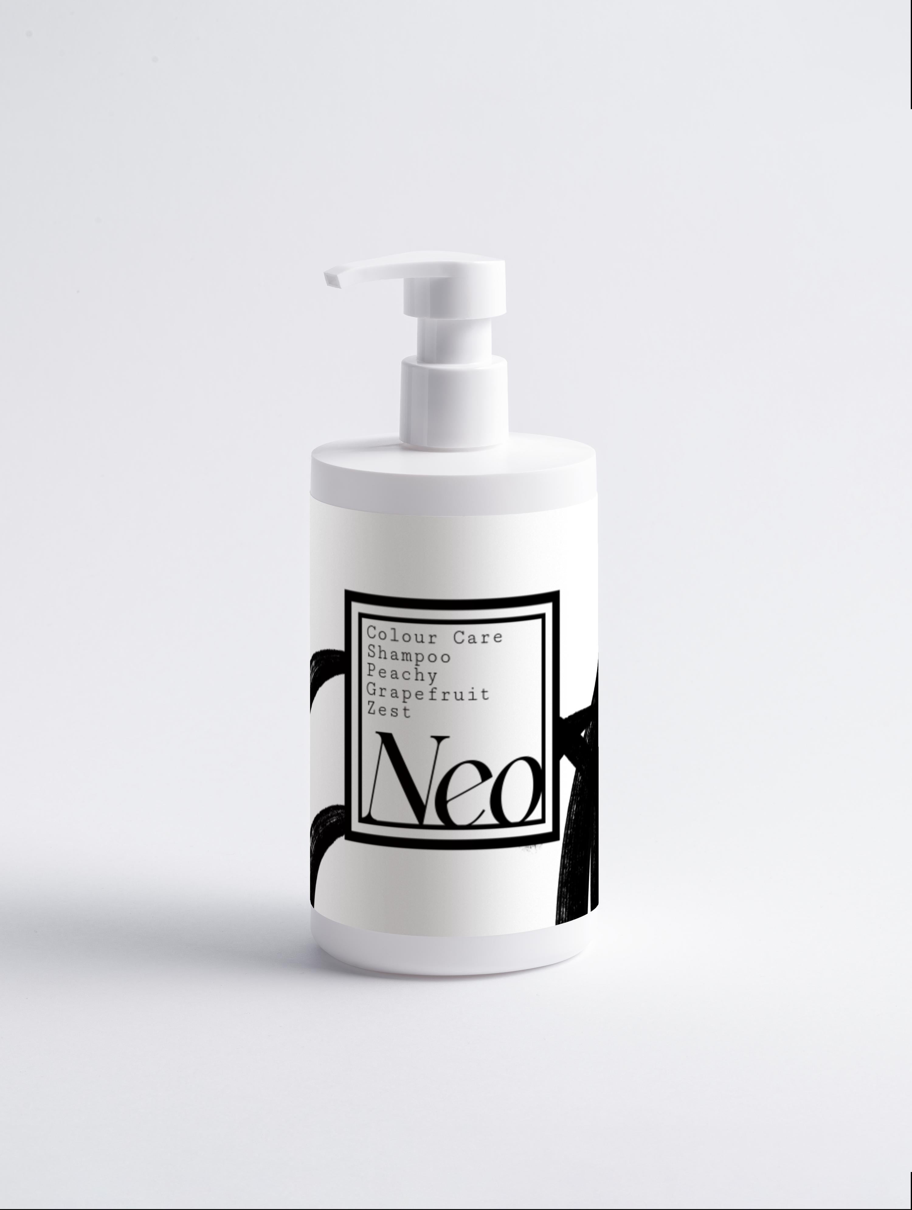 White shampoo bottle with a label on a light gray background